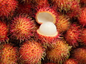 Fresh Cluster Of Pulasan Fruits Wallpaper