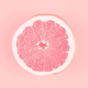 Fresh, Juicy Pink Grapefruit Halves Wallpaper