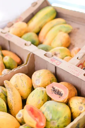 Fresh Papaya Fruits In Boxes Wallpaper