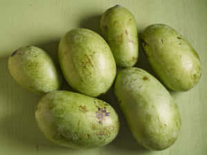 Fresh Pawpaw Fruit Green Background Wallpaper