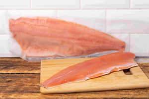 Fresh Pink Salmon Filleton Cutting Board Wallpaper