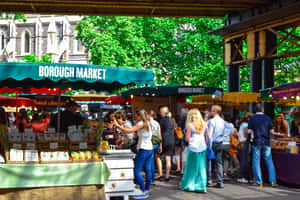 Fresh Produce At A Bustling Farmers Market Wallpaper