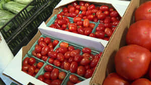 Fresh Produce At A Bustling Farmers Market Wallpaper