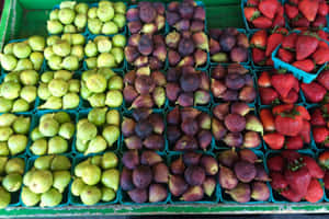 Fresh Produce At A Bustling Farmers Market Wallpaper