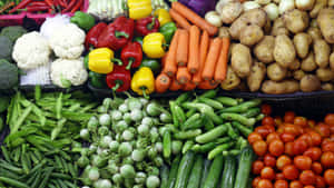 Fresh Produce At A Bustling Farmers Market Wallpaper