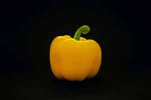 Fresh Whole Yellow Bell Pepper Wallpaper