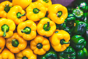 Fresh Yellow Bell Pepper On A Wooden Surface Wallpaper