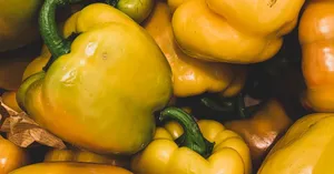 Fresh Yellow Bell Pepper On A Wooden Surface Wallpaper