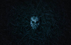 Friday The 13th Mask In Grass Wallpaper