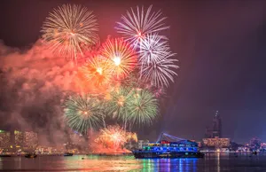 Friends Enjoying A Vibrant Beach Party Wallpaper