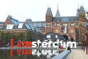 Front Of Rijksmuseum With Amsterdam Sign Wallpaper