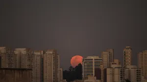 Full Moon Rise Over Cityscape Wallpaper