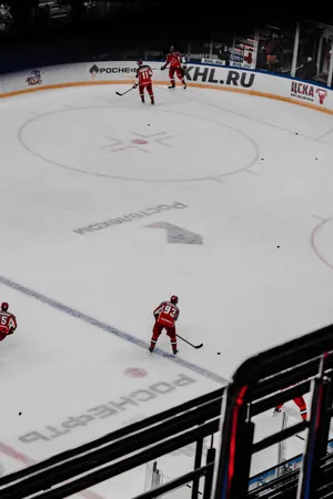 Fun And Excitement On The Ice Rink Wallpaper