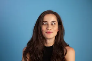 Funny Face Cross-eyed Woman Wallpaper