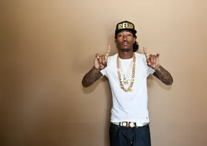 Future Rapper Pfp With Gold Chain Wallpaper