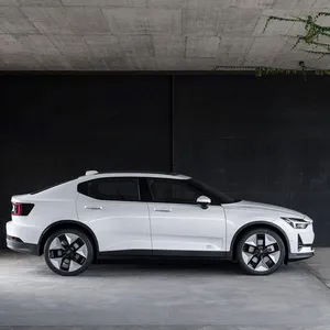 Futuristic Electric Vehicle On A Scenic Road Wallpaper