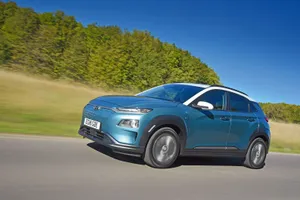 Futuristic Electric Vehicle On The Road Wallpaper