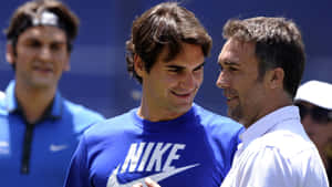 Gabriel Batistuta And Roger Federer Wallpaper