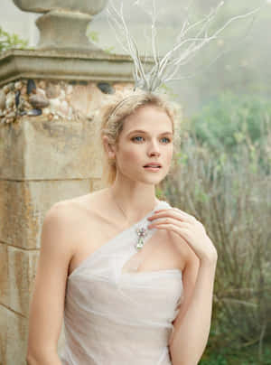 Gabriella Wilde In Captivating Elegance Wallpaper