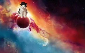 Galaxy Cat Perching On A Planet Wallpaper