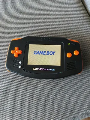 Game Boy Advance Consoleon Textured Background Wallpaper