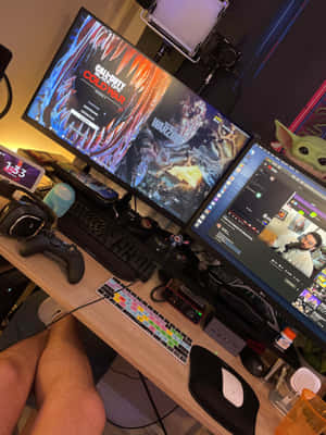 Gamer Setupwith Dual Monitorsand Streaming Equipment Wallpaper