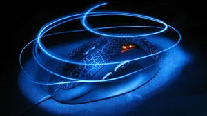 Gamers Play In Style With An Ergonomic Gaming Mouse Wallpaper