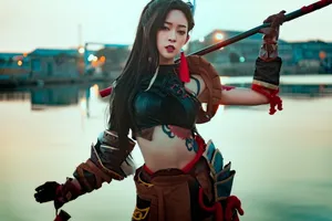 Gaming Cosplay Enthusiasts In Iconic Character Costumes Wallpaper