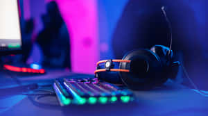 Gaming Headsetand Keyboard Night Setup Wallpaper