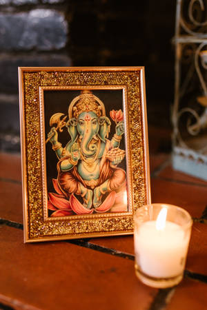 Ganesh Chaturthi Gold Framed Wallpaper