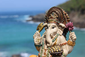 Ganesh Ji Hd Against The Beach Wallpaper