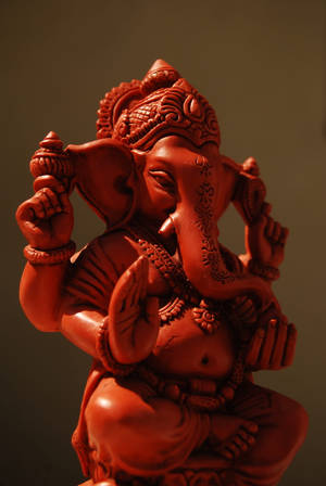 Ganesh Ji Hd All-red Statue Wallpaper