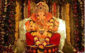 Ganpati Hd With Flowers Wallpaper