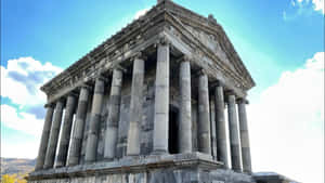 Garni Temple Under Bright Blue Sky Wallpaper