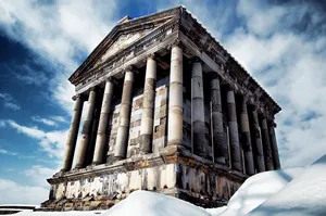 Garni Temple With Blue Sky And Clouds Wallpaper
