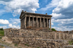 Garni Temple With Rock Wall Wallpaper