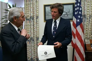 Gary Hart Conversing With Edward Hidalgo Wallpaper