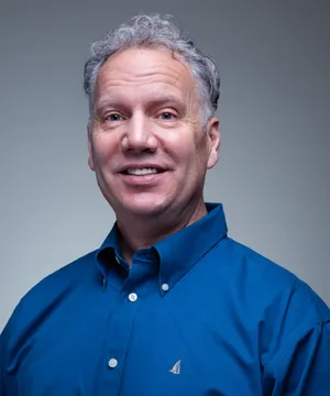 Gary Johnson In Blue With A Gray Backdrop Wallpaper