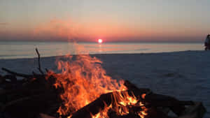 Gather Around The Crackling Beach Bonfire Wallpaper