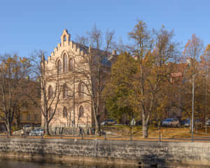 Gavle Historic Buildingby River Wallpaper