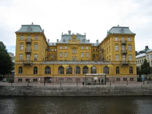 Gavle Riverfront Yellow Building Wallpaper