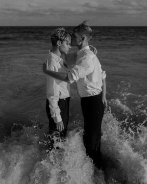 Gay Couple In The Sea Wallpaper