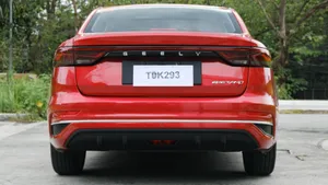 Geely Emgrand Gliding Down The Highway Wallpaper