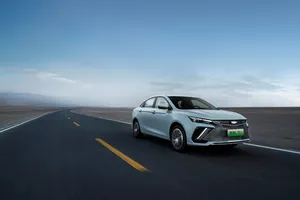 Geely Emgrand Sedan On Desert Road.jpg Wallpaper