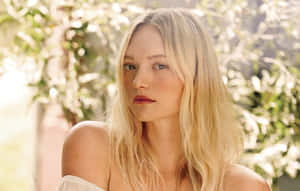 Gemma Ward Posing Gracefully Outdoors Wallpaper