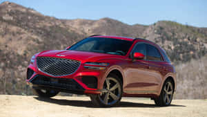 Genesis Gv70 Luxury Suv In Action Wallpaper