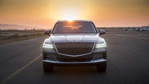 Genesis Gv80 Luxury Suv On The Move Wallpaper