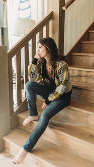 Genevieve Padalecki Striking A Confident Pose Wallpaper