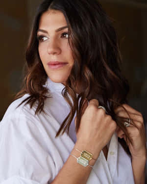 Genevieve Padalecki Striking A Pose In A Natural Setting Wallpaper