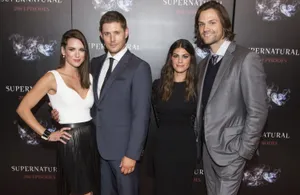 Genevieve Padalecki Striking A Pose In A Red Dress Wallpaper